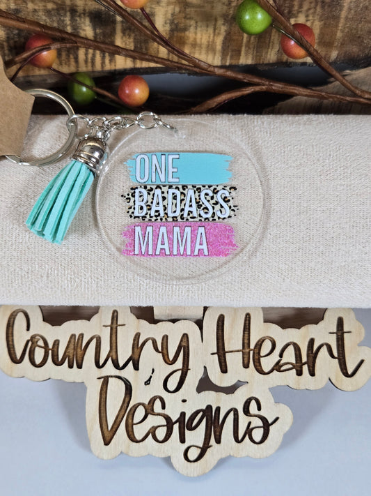 #824 One Badass Mama Keychain **𝑶𝒏𝒍𝒚 1 𝒊𝒏 𝑺𝒕𝒐𝒄𝒌**