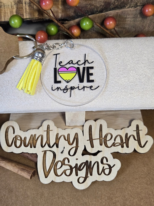 #833 Teach Love Inspire Keychain  **𝑶𝒏𝒍𝒚 1 𝒊𝒏 𝑺𝒕𝒐𝒄𝒌**