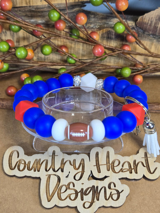 #919 New York Giants Inspired Wristlet 🏈😉  **1 𝑎𝑣𝑎𝑖𝑙𝑎𝑏𝑙𝑒 𝑚𝑎𝑑𝑒 𝑏𝑢𝑡 𝑡ℎ𝑖𝑠 𝑖𝑡𝑒𝑚 𝑤𝑖𝑙𝑙 𝑏𝑒 𝑟𝑒𝑠𝑡𝑜𝑐𝑘𝑒𝑑/𝑚𝑎𝑑𝑒 𝑎𝑠 𝑖𝑡 𝑠𝑒𝑙𝑙𝑠 𝑜𝑢𝑡!!
