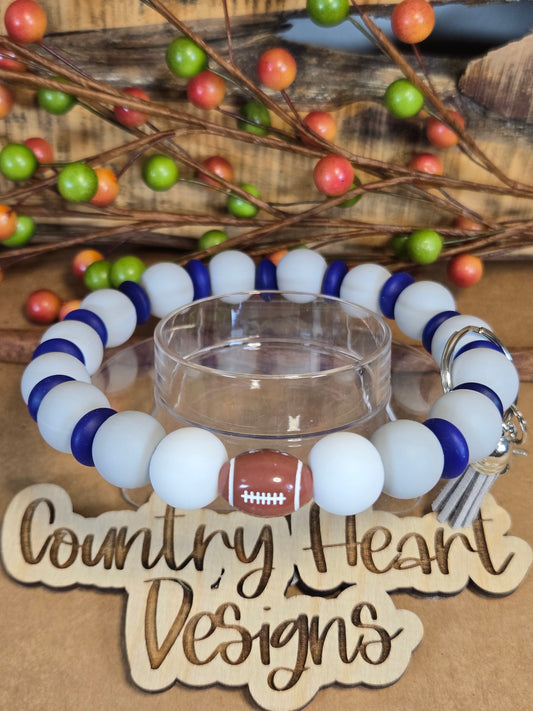 #986 Dallas Cowboys Inspired Wristlet🏈😉  **1 𝑎𝑣𝑎𝑖𝑙𝑎𝑏𝑙𝑒 𝑚𝑎𝑑𝑒 𝑏𝑢𝑡 𝑡ℎ𝑖𝑠 𝑖𝑡𝑒𝑚 𝑤𝑖𝑙𝑙 𝑏𝑒 𝑟𝑒𝑠𝑡𝑜𝑐𝑘𝑒𝑑/𝑚𝑎𝑑𝑒 𝑎𝑠 𝑖𝑡 𝑠𝑒𝑙𝑙𝑠 𝑜𝑢𝑡!!