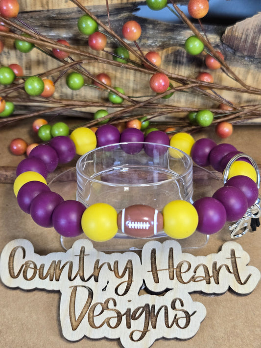 #989 Washington Commanders Inspired Wristlet🏈😉  **1 𝑎𝑣𝑎𝑖𝑙𝑎𝑏𝑙𝑒 𝑚𝑎𝑑𝑒 𝑏𝑢𝑡 𝑡ℎ𝑖𝑠 𝑖𝑡𝑒𝑚 𝑤𝑖𝑙𝑙 𝑏𝑒 𝑟𝑒𝑠𝑡𝑜𝑐𝑘𝑒𝑑/𝑚𝑎𝑑𝑒 𝑎𝑠 𝑖𝑡 𝑠𝑒𝑙𝑙𝑠 𝑜𝑢𝑡!!