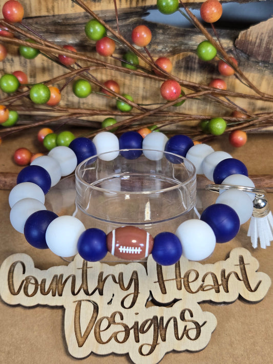 #992 Dallas Cowboys Inspired Wristlet🏈😉  **1 𝑎𝑣𝑎𝑖𝑙𝑎𝑏𝑙𝑒 𝑚𝑎𝑑𝑒 𝑏𝑢𝑡 𝑡ℎ𝑖𝑠 𝑖𝑡𝑒𝑚 𝑤𝑖𝑙𝑙 𝑏𝑒 𝑟𝑒𝑠𝑡𝑜𝑐𝑘𝑒𝑑/𝑚𝑎𝑑𝑒 𝑎𝑠 𝑖𝑡 𝑠𝑒𝑙𝑙𝑠 𝑜𝑢𝑡!!